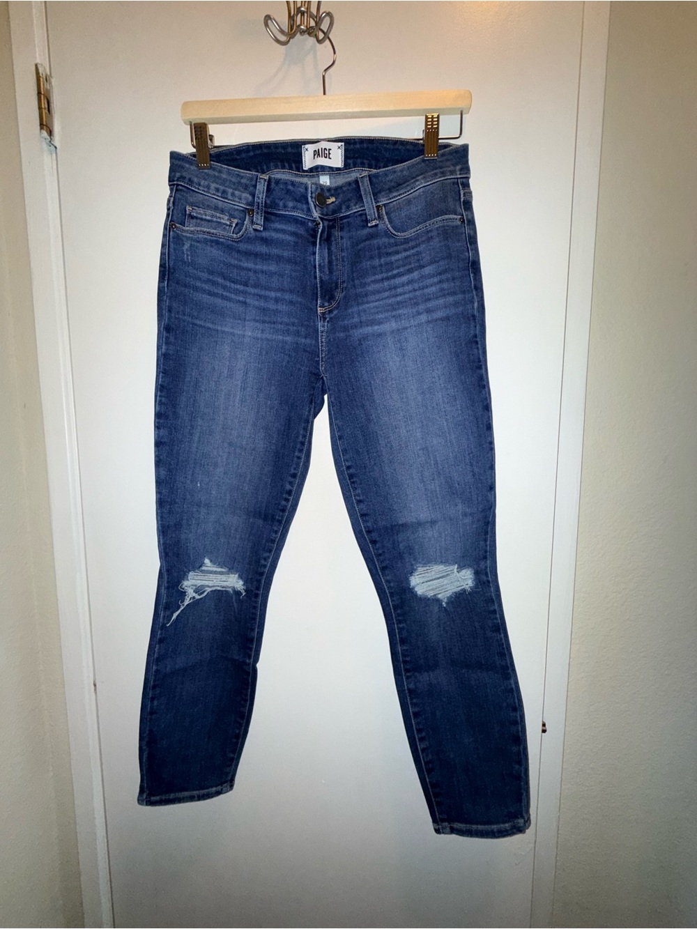 PAIGE Skinny Jeans in Dark Blue with Knee Distressing